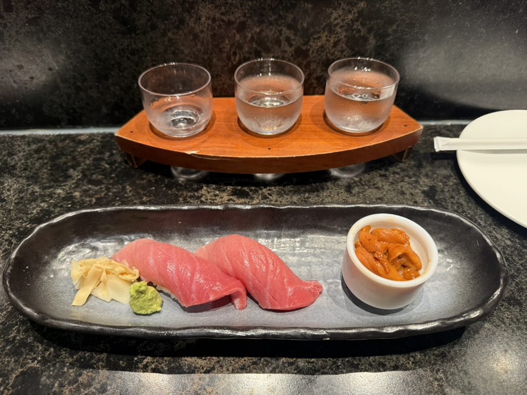 A sake flight in Japan during a January festival trip